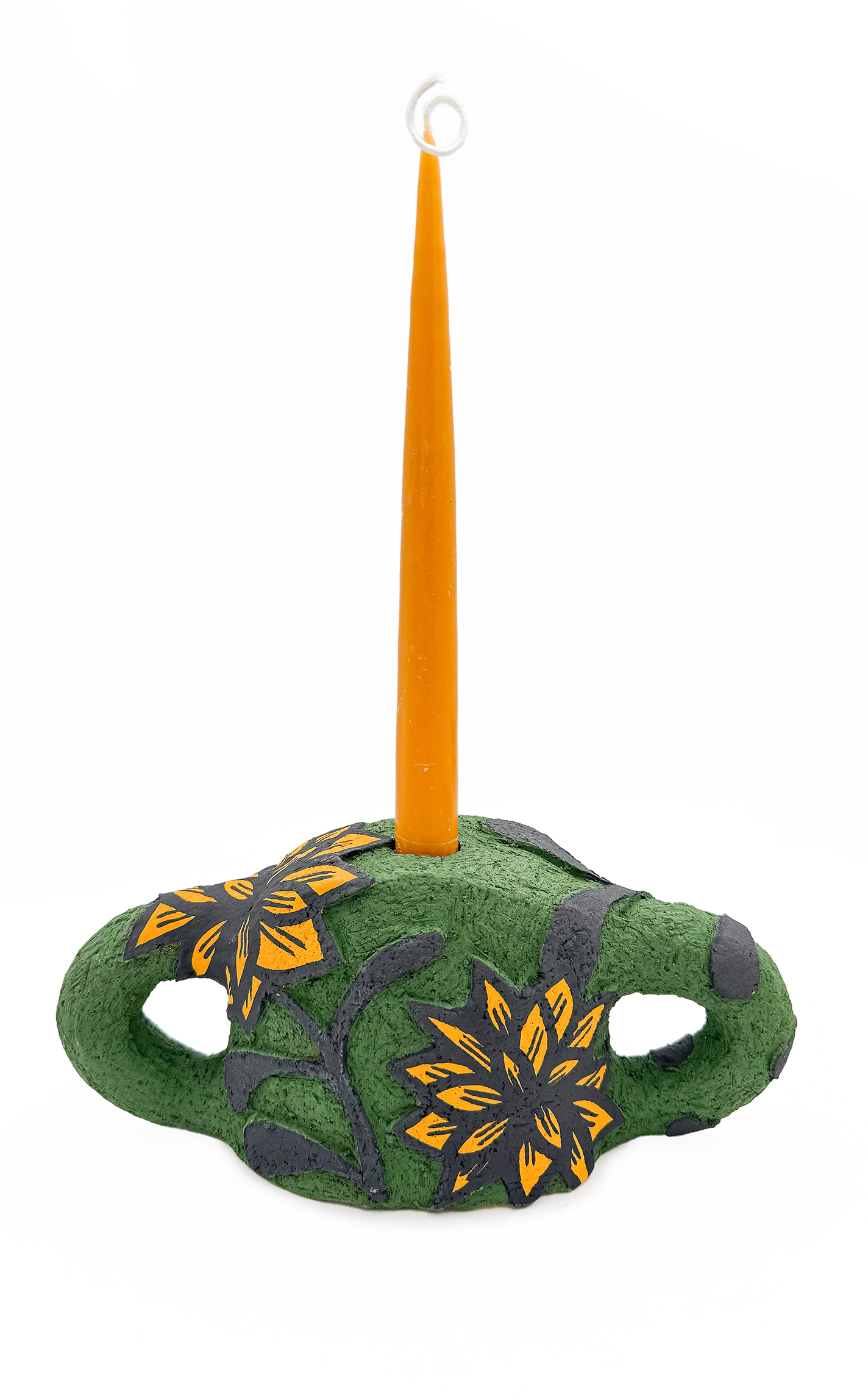 Green ceramic candlestick with yellow flowers