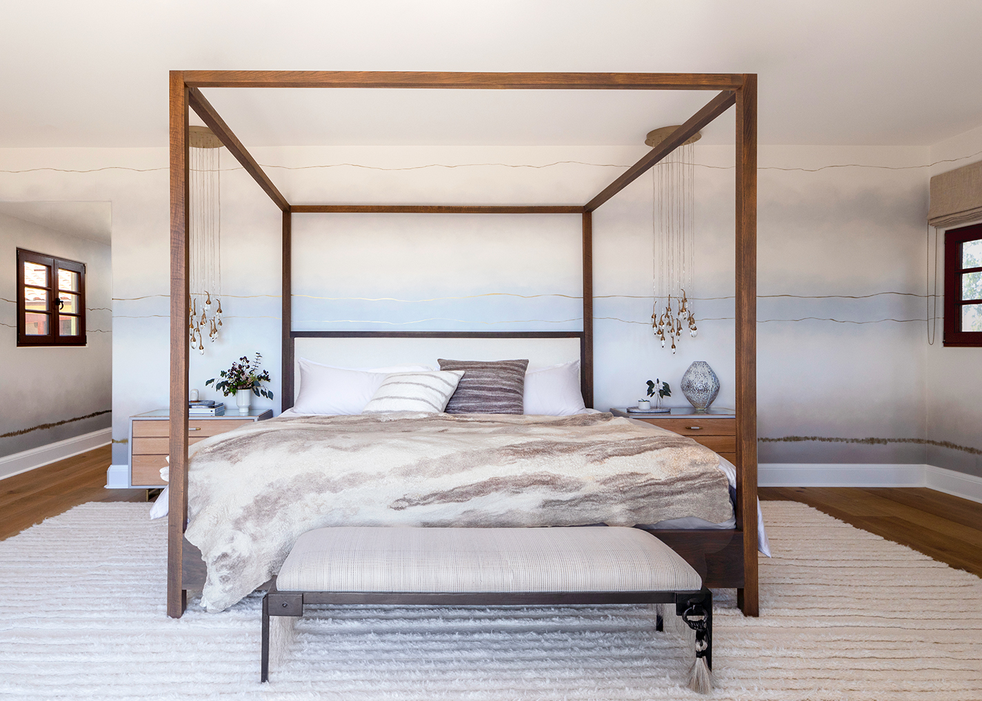 Felted blanket and pillows incorporated in a bedroom design