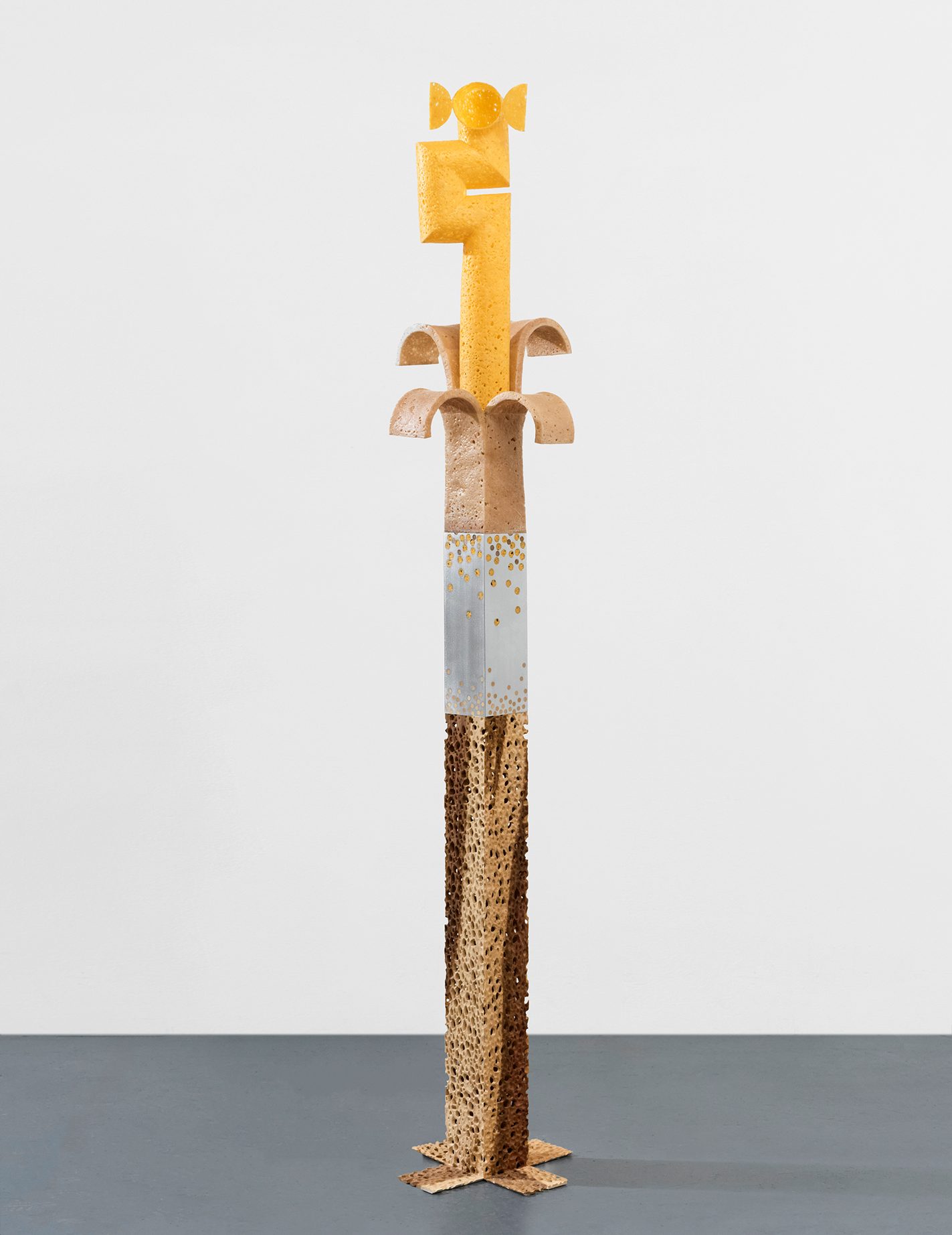 Tall sculpture made of aluminum, poplar, and dish sponge