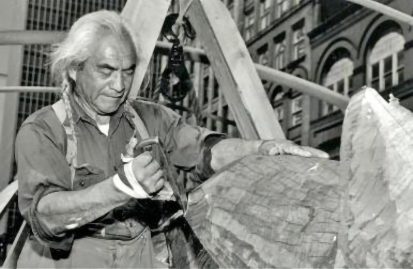 Friday's Grandpa Joe carving a totem pole