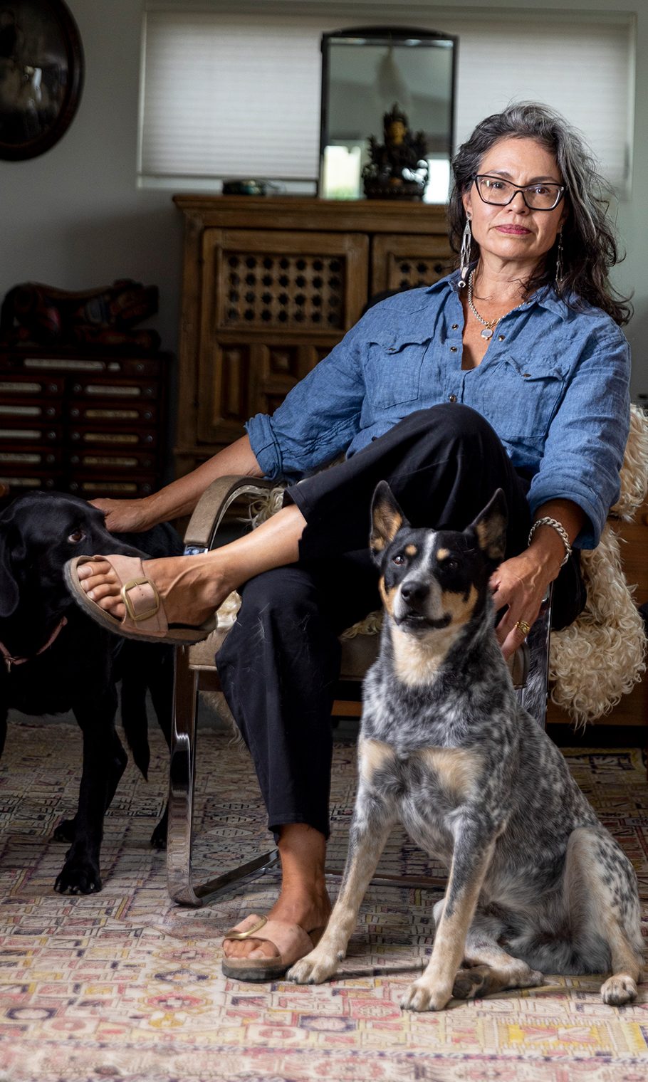 Ataumbi with her dogs, Angus and Furgus.