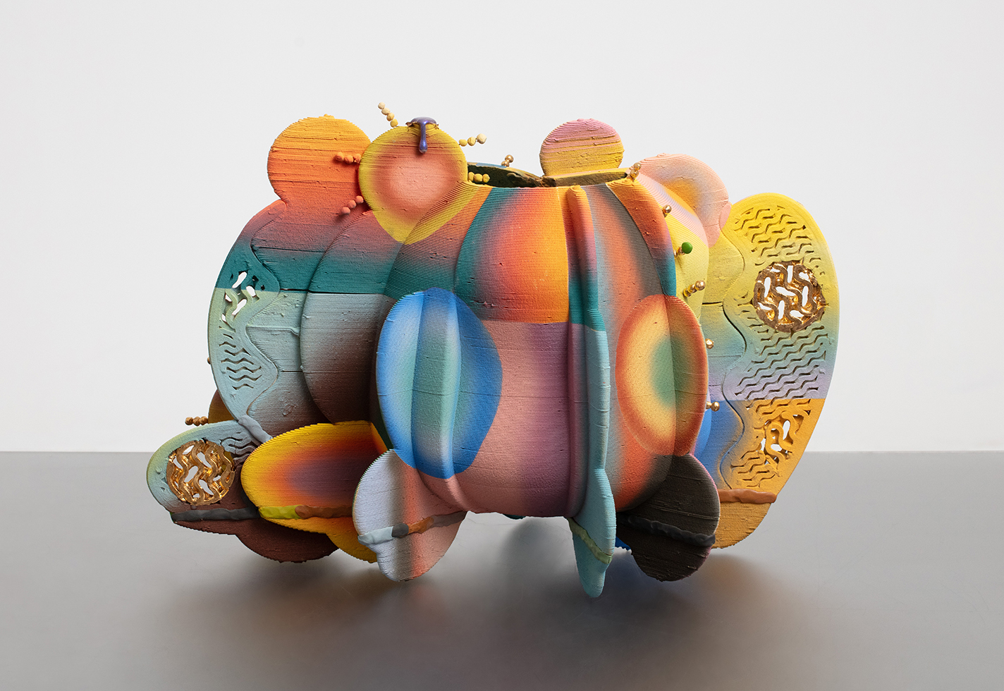 Multicolored, multi-textured stoneware vessel