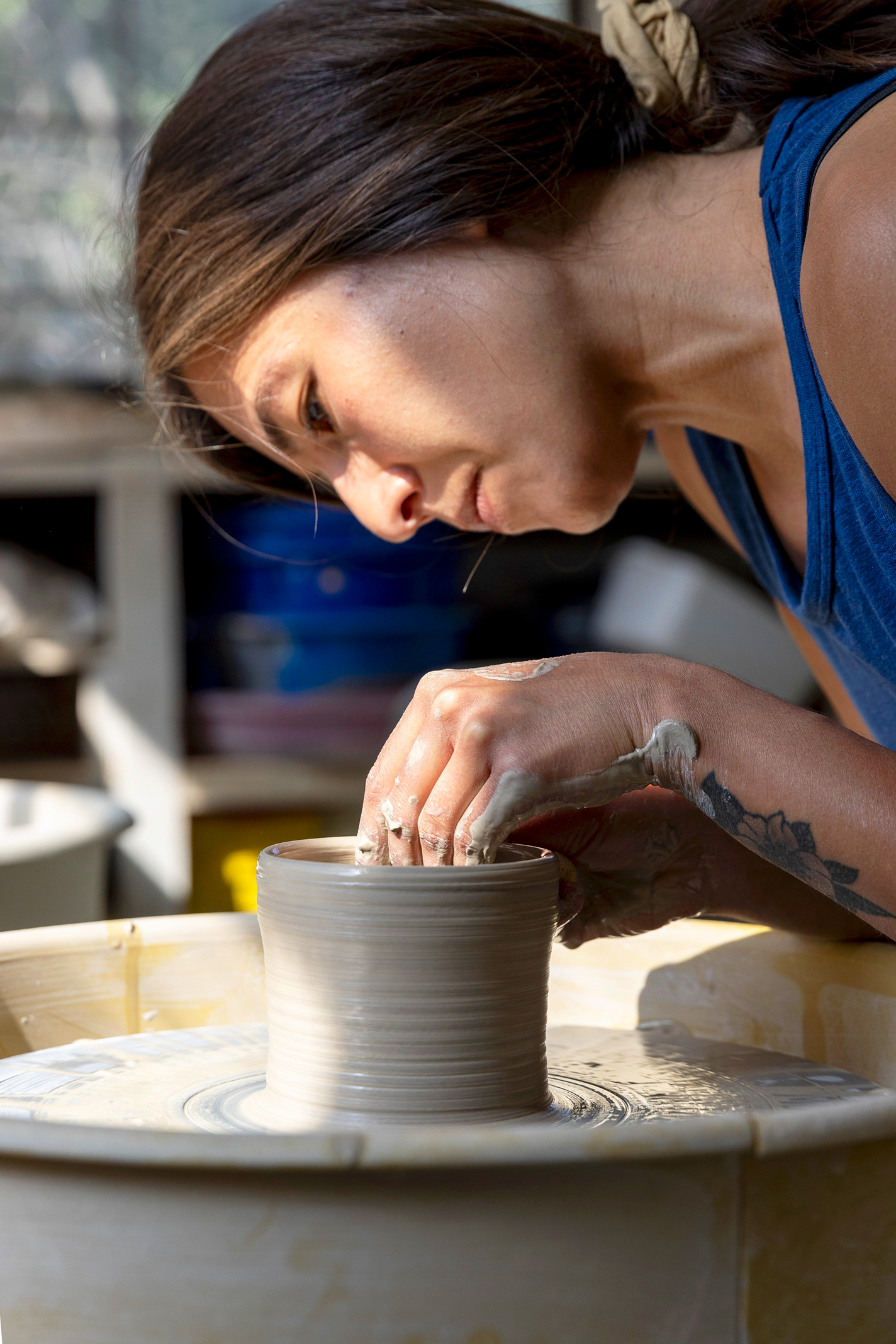 Upshaw throwing on the wheel.