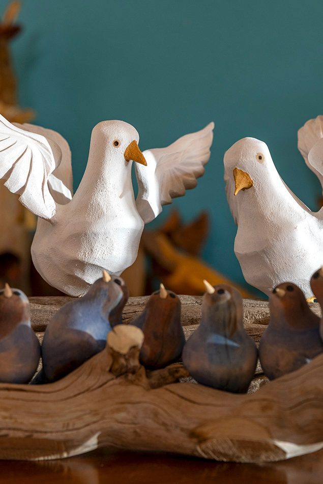 Doves carved from cedar, aspen, cottonwood, and various roots.