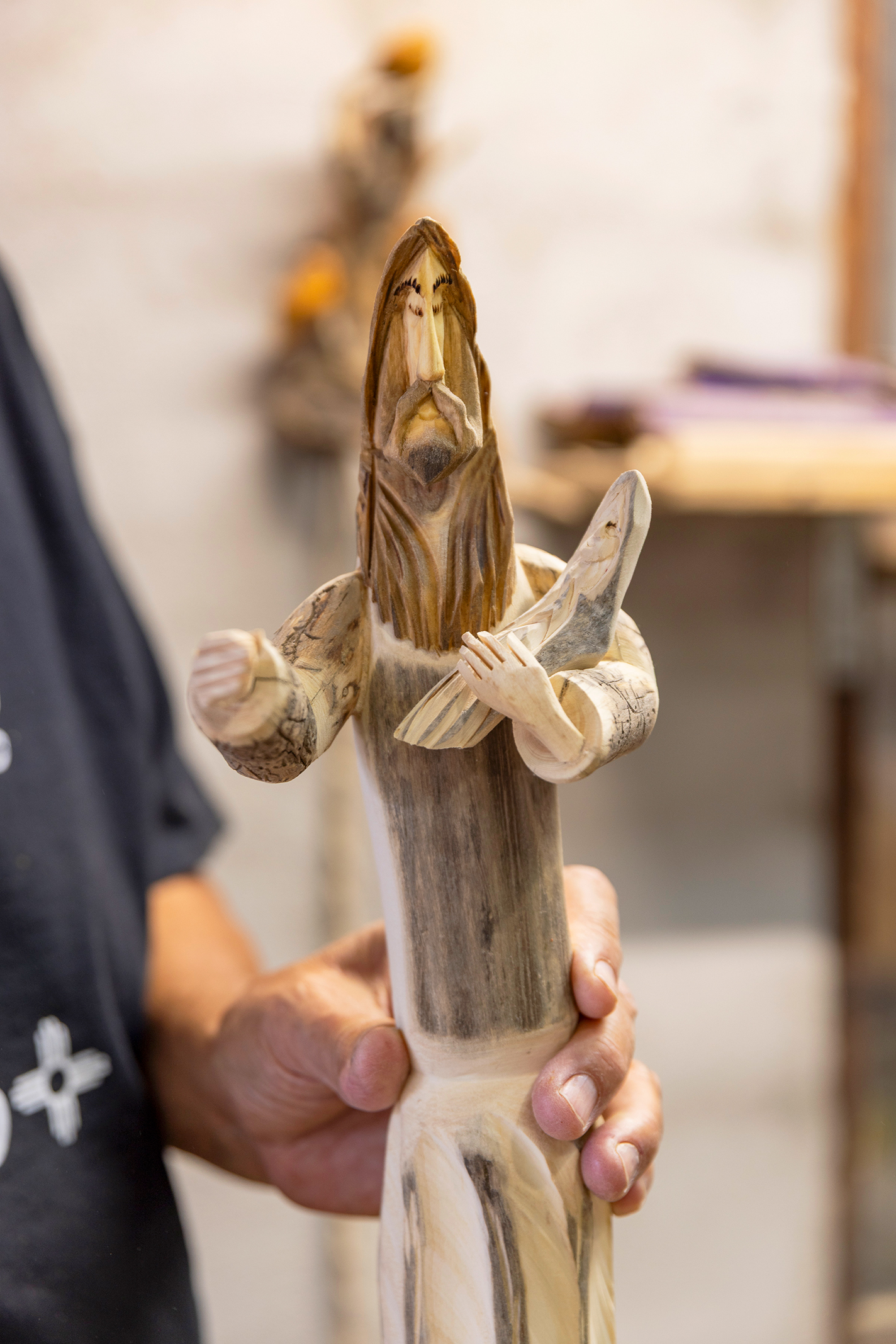 An in-progress aspen carving of St. Joseph and child.